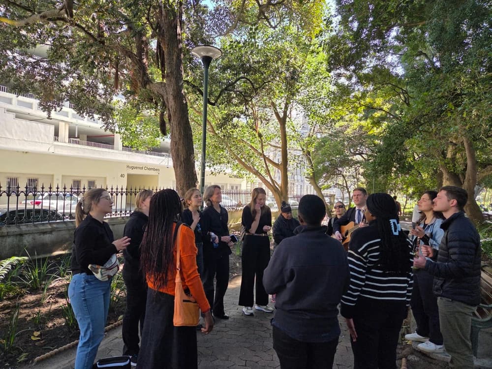 Protestors prayer together